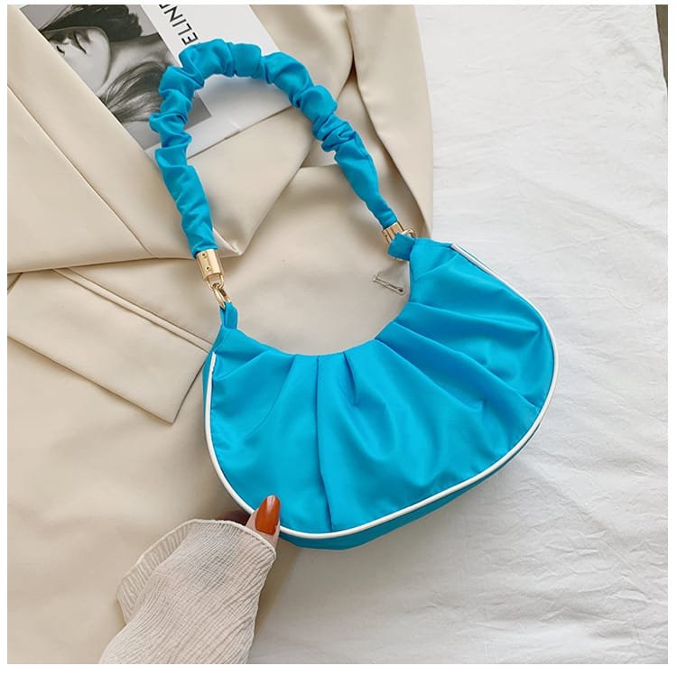 NEON TEXTURED SLING BAG