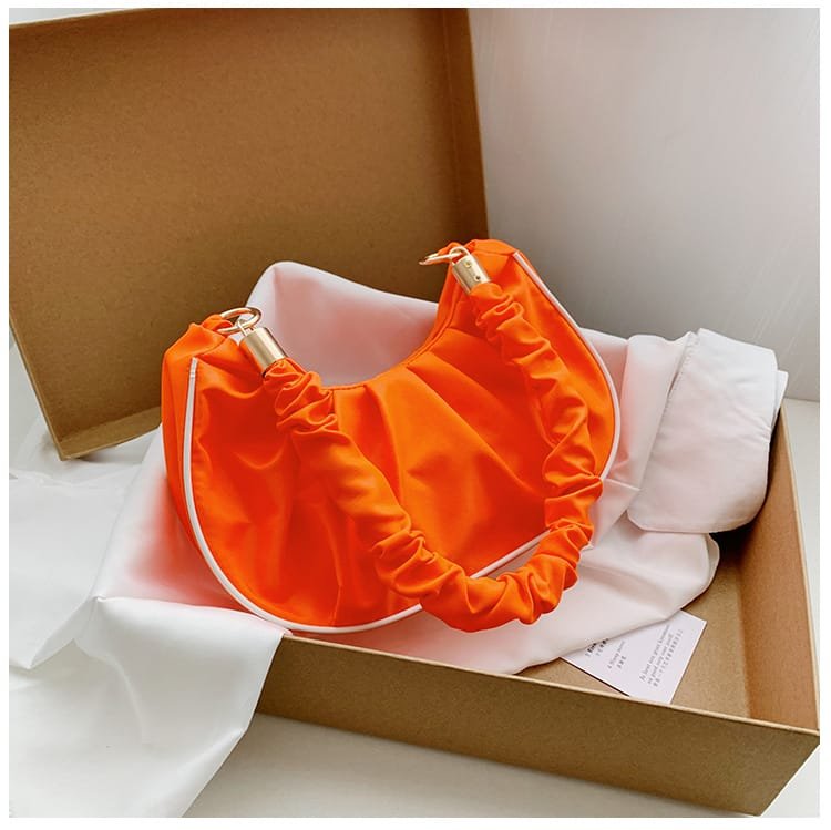 NEON TEXTURED SLING BAG